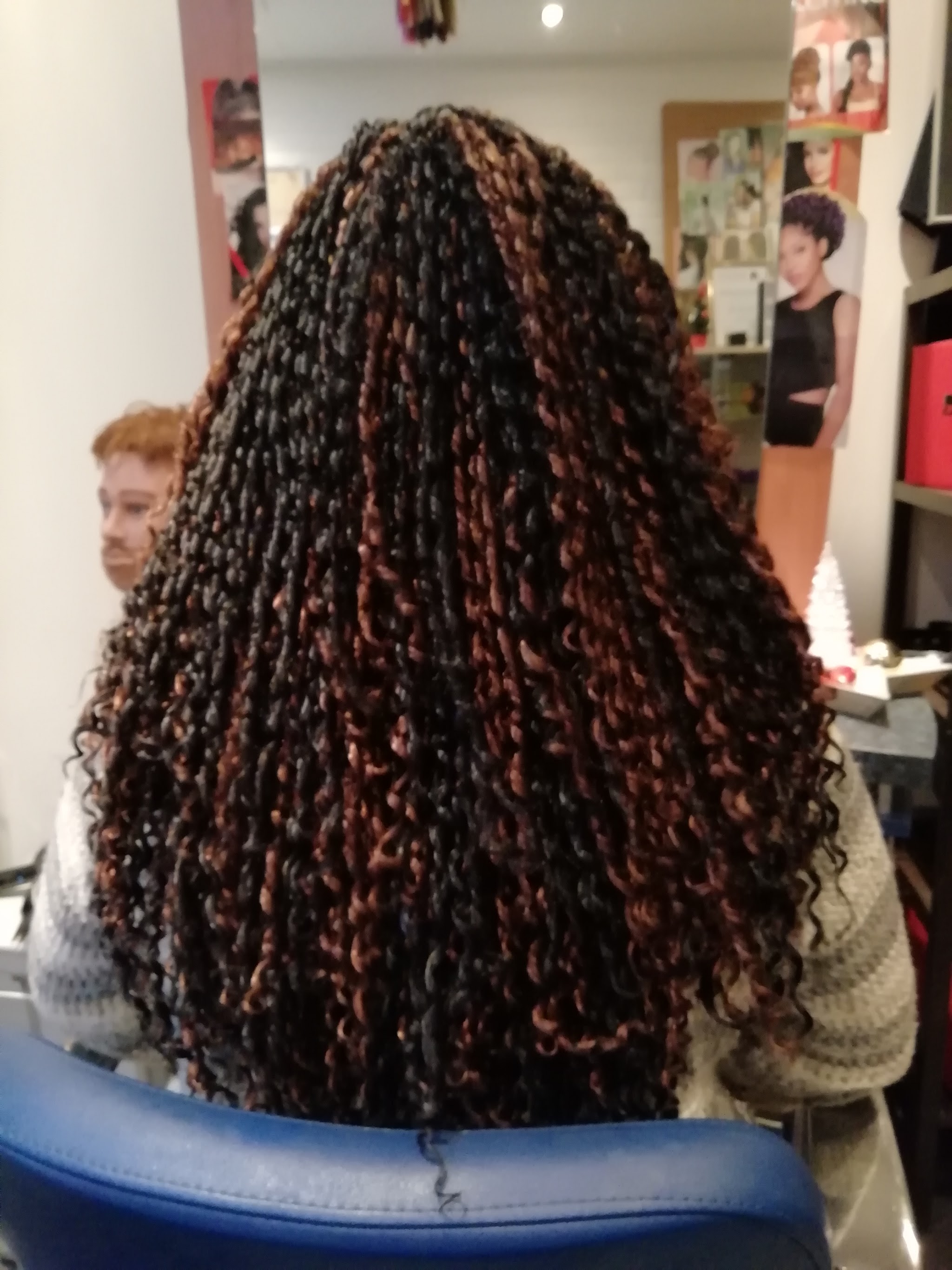 Lange twists in zwart met koperkleurige strengen ertussen